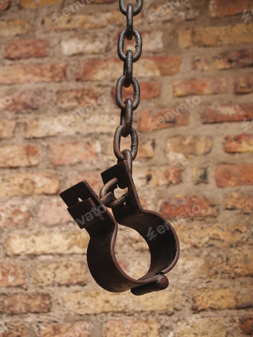 Preview: Old Shackles Against A Brick Wall