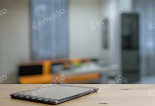 Preview: Tablet On Wooden Table In The Living Room