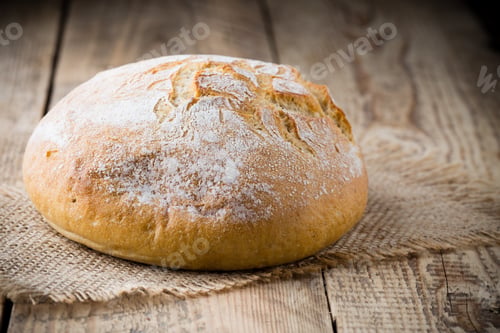 Preview: Fresh Bread On A Wooden Background. Studio Photography.