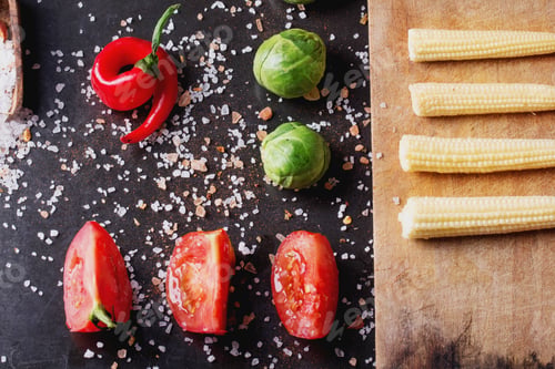 Preview: Mini Vegetables: Brussels Cabbage, Corn, Chili Pepper, Cut Tomato With Salt And Pepper On The