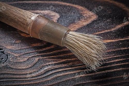 Preview: Vintage Paintbrush On Wooden Board Construction Concept.