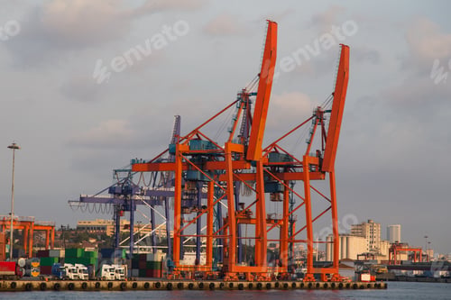 Preview: Orange Port Cranes In A Sea Port