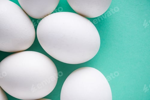 Preview: White Chicken Eggs On Green Pastel Background