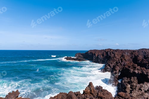 Preview: Beautiful Beach On The Island Of Lanzarote. Sandy Beach Surrounded By Volcanic Mountains / Atlantic