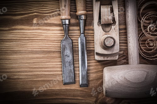 Preview: Lump Hammer Planer Firmer Chisels Planning Chips On Vintage Wood Board Construction Concept.