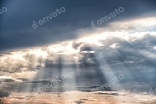 Preview: Sun Light Rays Filtering Through Thick Clouds.