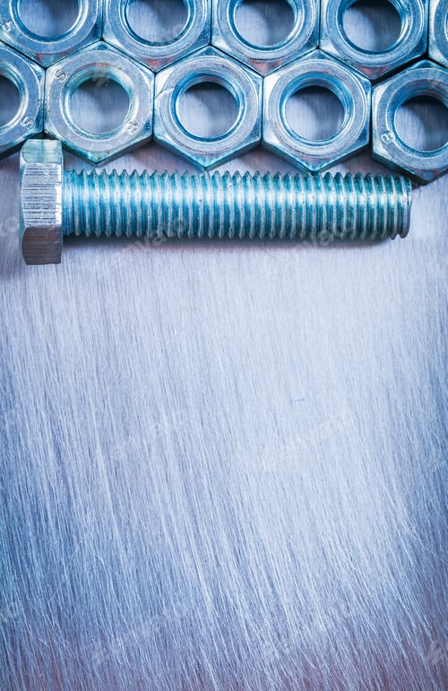Preview: Stainless Construction Nuts And Screw Bolt On Metallic Background Repairing Concept
