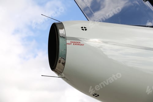 Preview: Exhaust Outlet Of A White Jet Airplane
