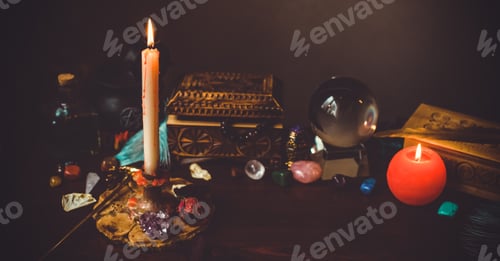 Preview: A Fortune Teller, Witch Stuff On A Table, Candles And Fortune-Telling Objects. The Concept Of