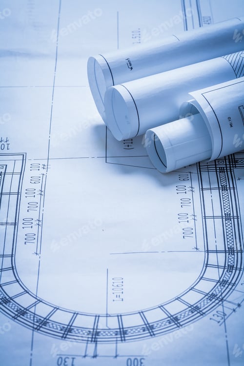 Preview: Rolled Up Construction Plans Building And Architecture Concept
