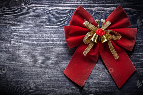 Preview: Christmas Red Bow On Wooden Board Holidays Concept.