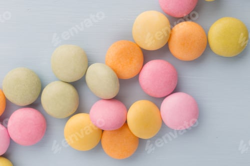 Preview: Small Round Candy-Colored Pastels On Pastel Background.
