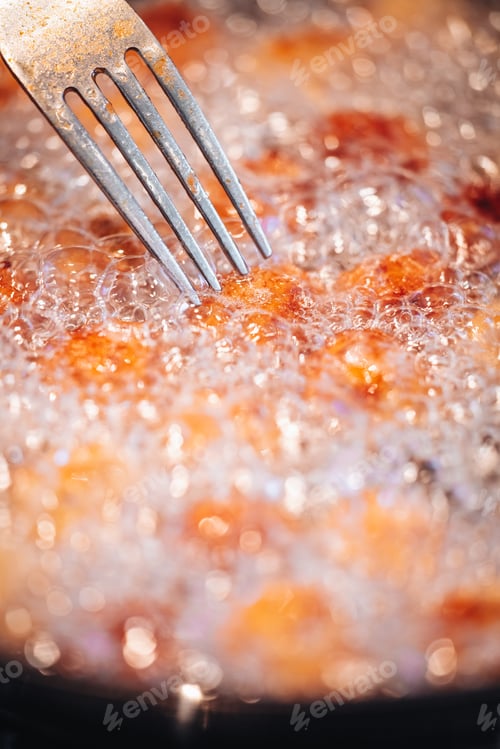Preview: Frying Home Made Italian Traditional Meatballs With Parmesan And Bread