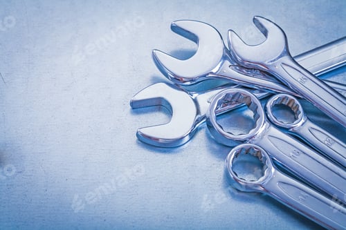 Preview: Steel Open-End Wrenches And Flat Spanners On Metallic Background Construction Concept
