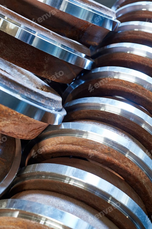 Preview: Closeup Of Round Steel Billets At An Engineering Plant. Industrial Background.