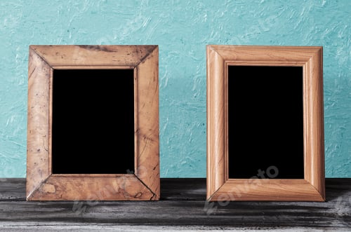Preview: Wooden Photo Frames On Table, Blue Wall