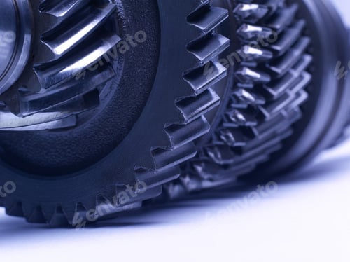 Preview: The Group Of Gears, A Detail Of The Mechanism On The White Background. Studio High-Resolution Image.
