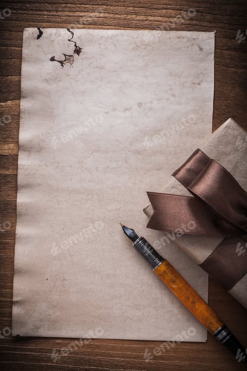Preview: Gift Box Tied Bow Paper Fountain Pen On Wood Board.