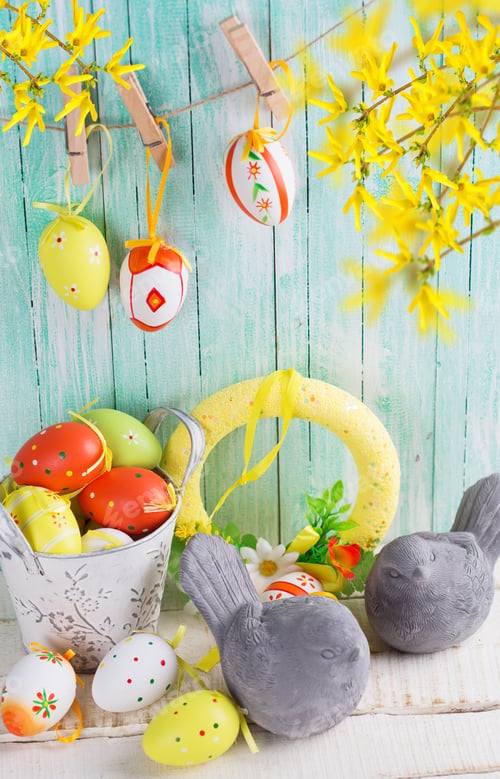 Preview: Colorful Easter Eggs And Birds On Wooden Background. Easter Background. Selective Focus Is On Left