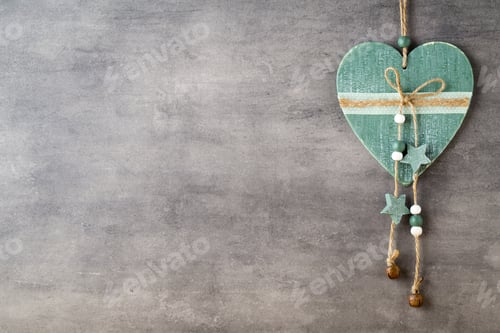 Preview: Decorative Heart Hanging Against a Grey Background
