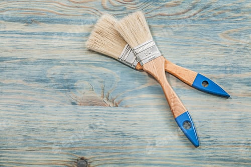 Preview: Paint Brushes on a Distressed Blue Wood Surface
