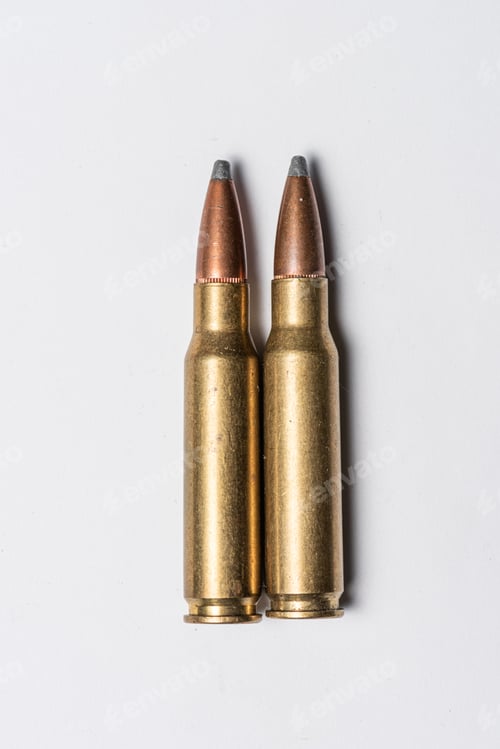 Preview: Old Rifle Bullets On White Background.