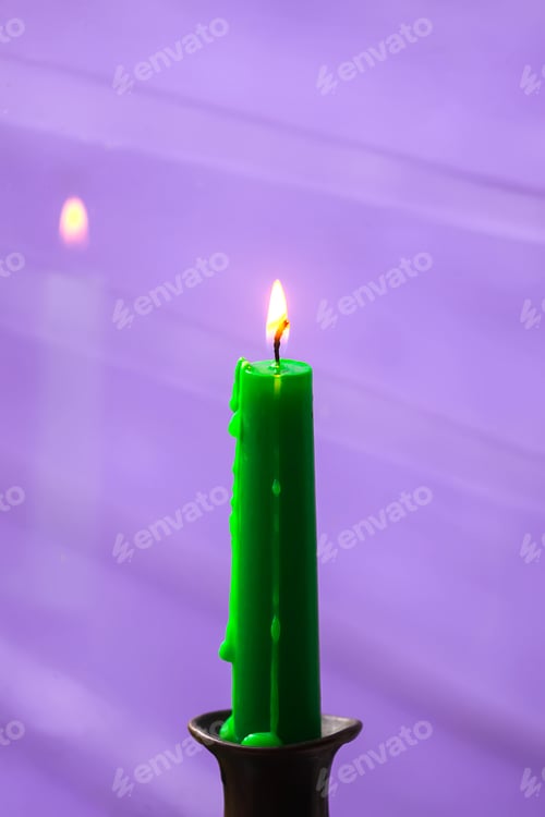 Preview: Green Candle In Vintage Copper Candle Holder On Wooden Table Near The Window In Country House