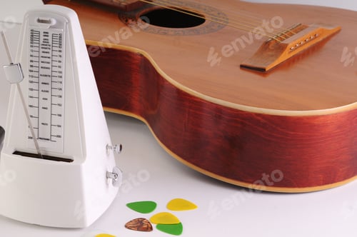 Preview: Guitar And Microphone On A White Background
