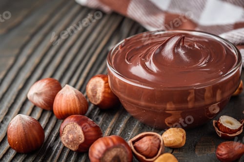 Preview: Toasts With Chocolate Butter On A Dark Wooden Rustic Background