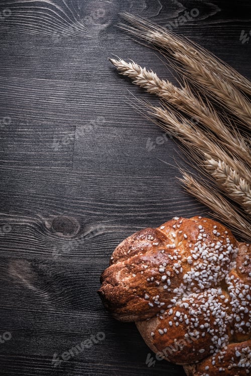 Preview: Bread Golden Wheat And Rye Ears On Wooden Board.