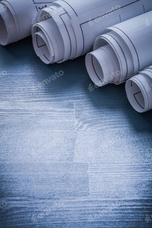 Preview: Five Rolls Of Blueprints Very Close Up.