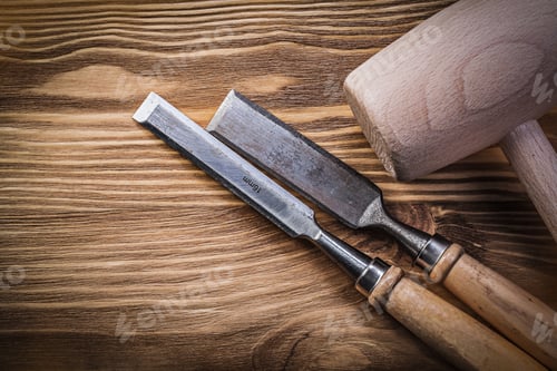Preview: Wooden Hammer Chisels On Vintage Wood Board Construction Concept.