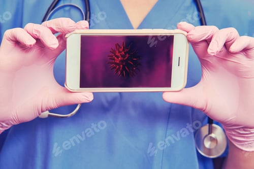 Preview: Doctor With A Phone In Her Hand, Close Up. Concept Of Remote Care For Patients With Coronavirus