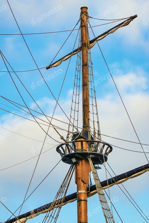 Preview: Masts Of Sailboats Against The Cloudy Sky