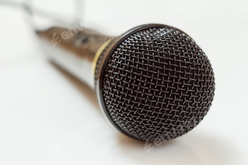 Preview: Close-Up View Of A Moden Professional Stage Microphone On The White Background. Shallow Depth Of