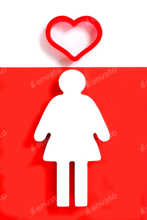 Preview: Wooden Female Figure On A Red Background With A Red Heart On A White Background Above Her