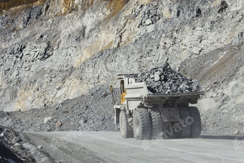Preview: Mining Dump Truck Loaded With Shale Rock, Mined In The Open Pit, Transports For Further Processing