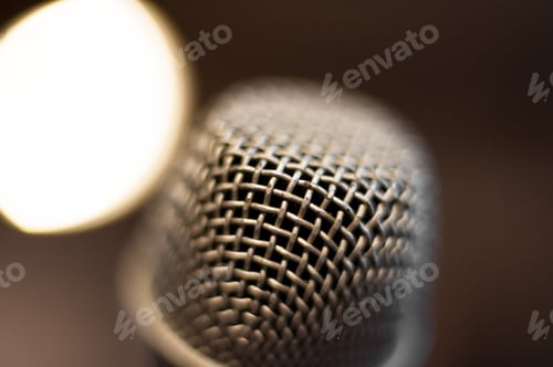 Preview: Microphone Head Extreme Close Up Out Of Focus Stage Lights In Background