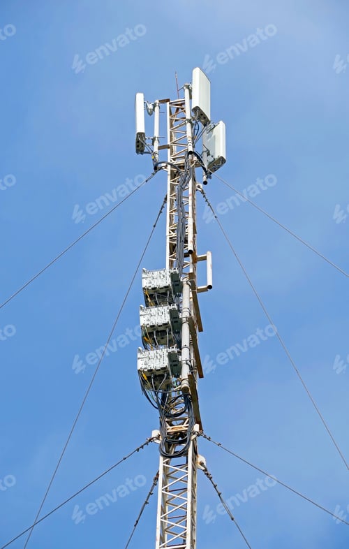 Preview: Tower With Aerials Of Cellular On A Background Blue Sky