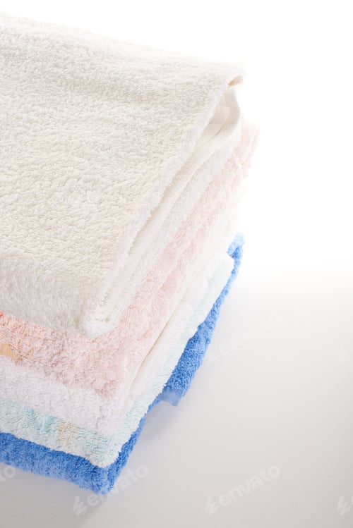 Preview: Stack Of Colored Towels On A White Background