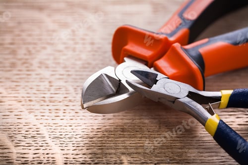 Preview: Tow Nippers On Wooden Board Construction Concept