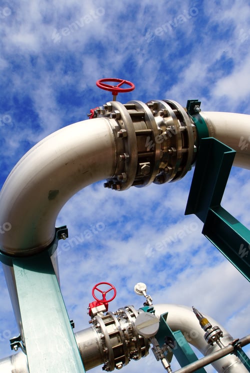 Preview: Industrial Pipelines On Pipe-Bridge Against Blue Sky