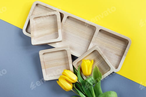 Preview: Wood Empty Plates For Snack And Flowers On The Color Grey And Yellow Background