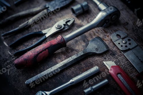 Preview: Color Image Of Many Tools On A Wooden Plank.