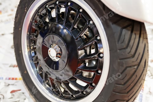 Preview: Photo Of Three Wheel Scooter Back Wheel; Note Shallow Depth Of Field