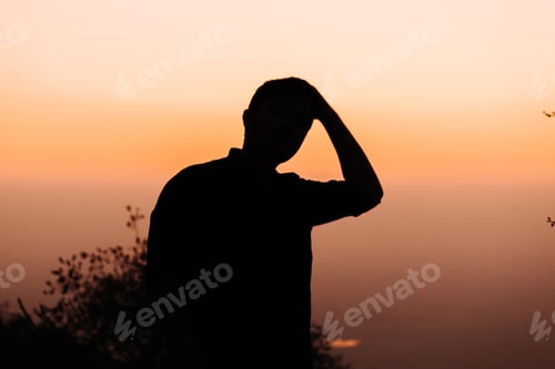 Preview: Silhouette Of A Man During Sunset At Sunset Point In Mount Abu, Rajasthan, India
