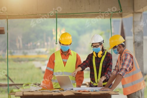 Preview: Female Inspectors And Architects Discuss With Head Engineer About Construction Project.Multi-Ethnic