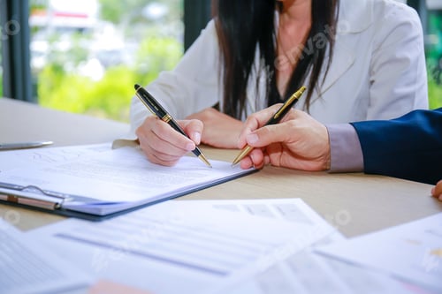Preview: Adult Male And Sales Manager Discuss Conditions Of Contract At Home