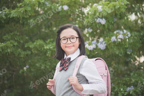 Preview: Beautiful Asian School Girl Wearing Glasses Outdoors,Back To School Concept