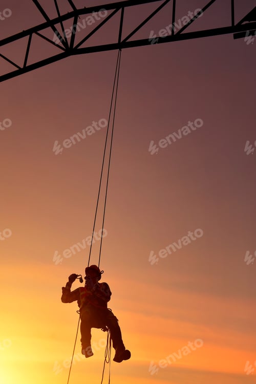 Preview: Construction Worker Wearing Safety Work At High Uniform On Scaffolding At Construction Site On